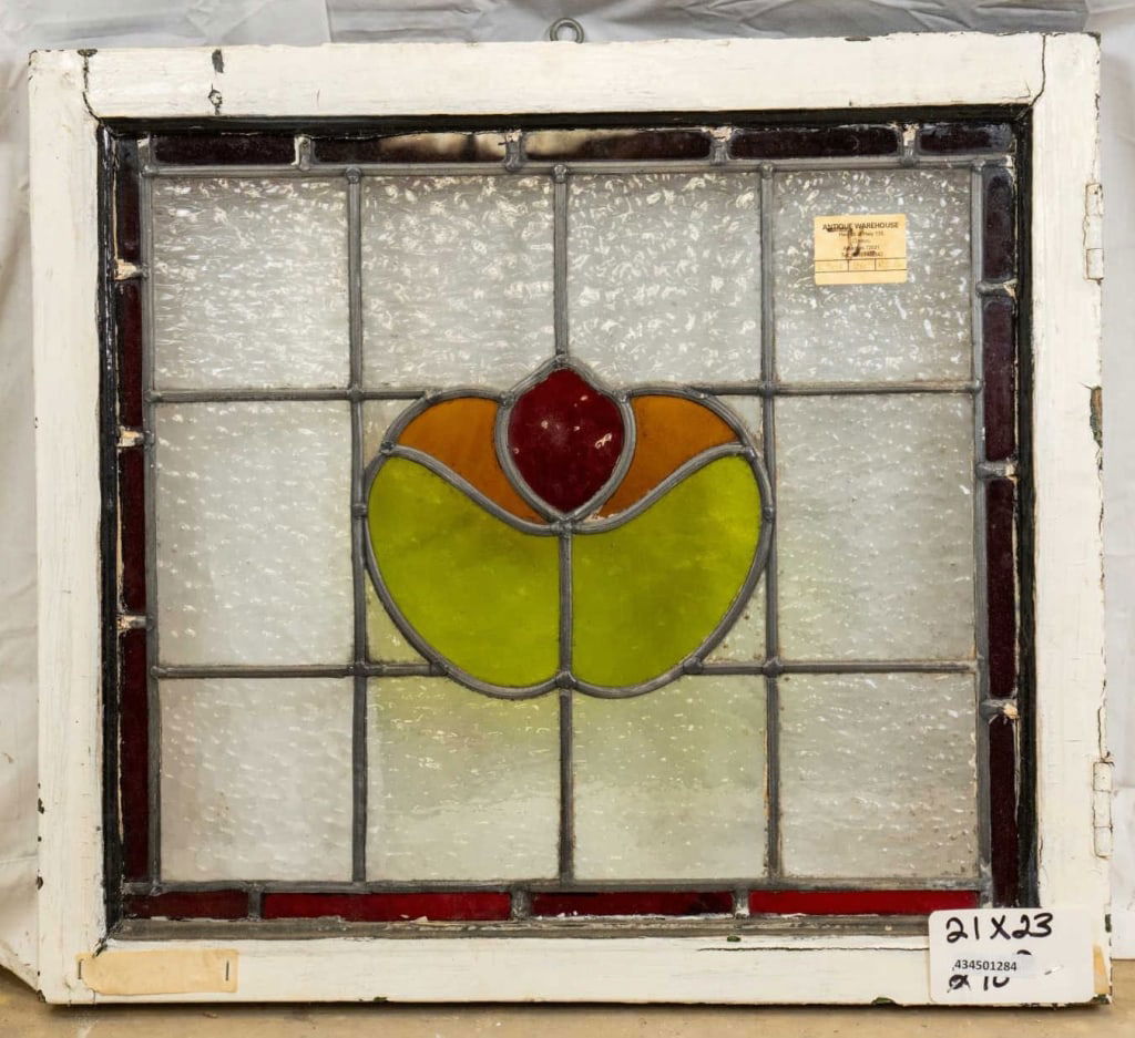 FRENCH ART NOUVEAU STAINED GLASS PANEL: French Art Nouveau stained glass panel with a floral medallion. Approximate dimensions: h. 21", w. 23" Disclaimer: This is an online court ordered bankruptcy sale. Participating bidders must have a cr