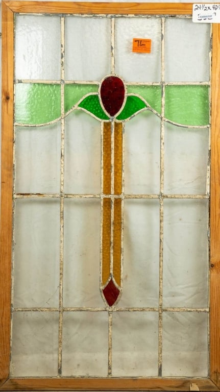 ENGLISH STAINED GLASS PANEL: English stained glass panel with floral motif. Approximate dimensions: h. 42.5", w. 24.5" Disclaimer: This is an online court ordered bankruptcy sale. Participating bidders must have a credit card on