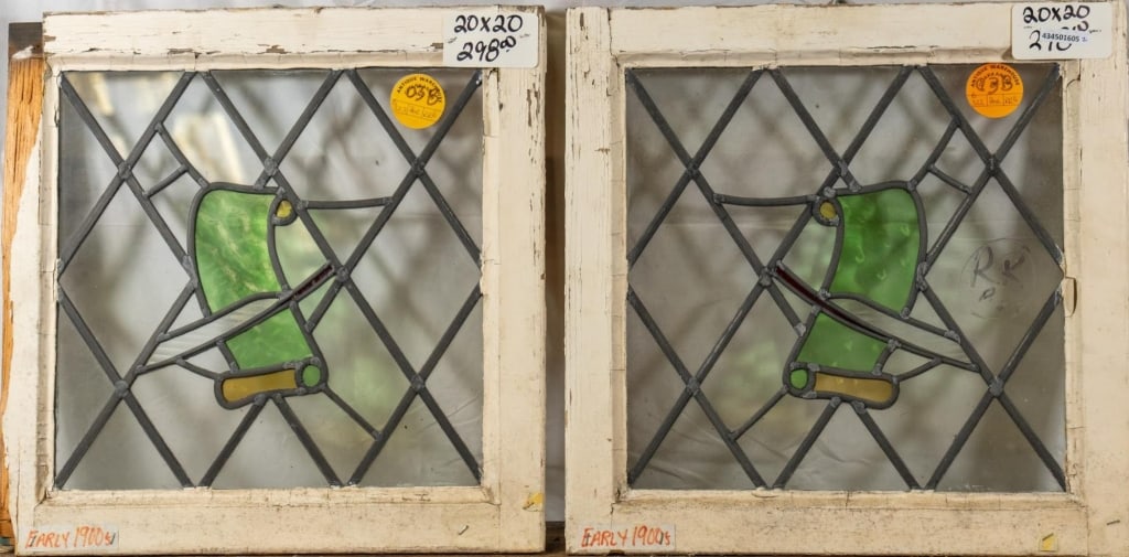 PAIR OF FRENCH STAINED GLASS PANELS: Pair of French stained glass panels with scroll and feather elements. Approximate dimensions: h. 20", w. 20" Disclaimer: This is an online court ordered bankruptcy sale. Participating bidders must hav