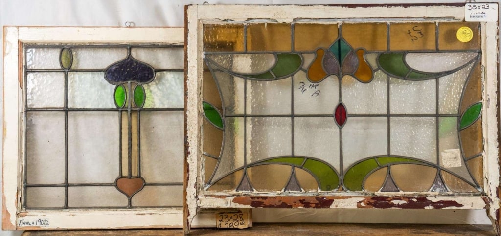 TWO FRENCH ART NOUVEAU STAINED GLASS PANELS: Two French Art Nouveau stained glass panels with multicolored accents. Approximate dimensions: h. 23", w. 35" Disclaimer: This is an online court ordered bankruptcy sale. Participating bidders must ha