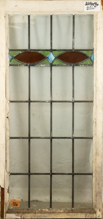 FRENCH ART NOUVEAU STAINED GLASS PANEL: French Art Nouveau stained glass panel with blue wispy glass accent. Approximate dimensions: h. 46", w. 22.5" Disclaimer: This is an online court ordered bankruptcy sale. Participating bidders must ha