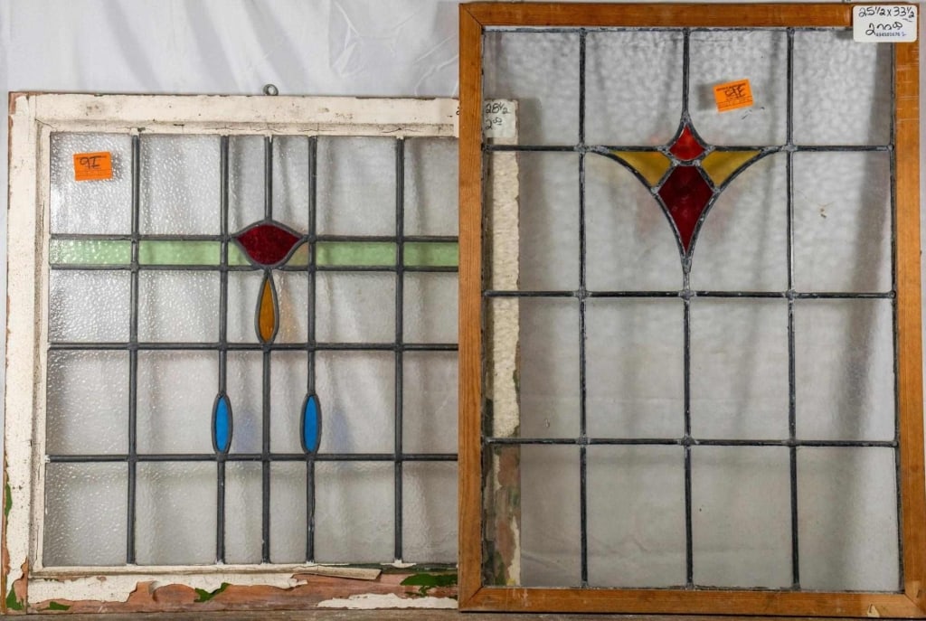 TWO ANTIQUE CONTINENTAL STAINED GLASS PANELS: Two antique Continental stained glass panels with multicolored stained glass accents. Approximate dimensions: h. 33.5", w. 25.5" Disclaimer: This is an online court ordered bankruptcy sale. Participat