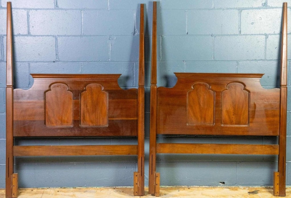 TWO AMERICAN MAHOGANY TWIN POSTER HEADBOARDS: Two American mahogany twin poster headboards. Approximate dimensions: h. 59", w. 42" Disclaimer: This is an online court ordered bankruptcy sale. Participating bidders must have a credit card on file