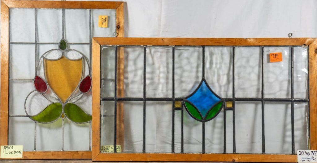 TWO ANTIQUE CONTINENTAL STAINED GLASS PANELS: Two antique Continental stained glass panels with multicolored stained glass accents. Approximate dimensions: h. 20.5", w. 37" Disclaimer: This is an online court ordered bankruptcy sale. Participatin