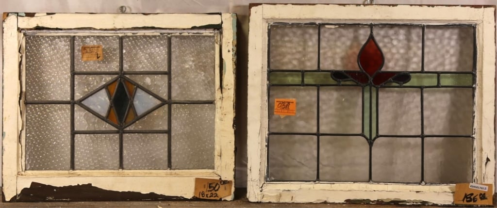 TWO ANTIQUE CONTINENTAL STAINED GLASS PANELS: Two antique Continental stained glass panels with floral and geometrical medallions. Approximate dimensions: h. 19", w. 23" Disclaimer: This is an online court ordered bankruptcy sale. Participating b
