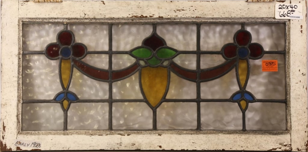 ENGLISH ART NOUVEAU STAINED GLASS PANEL: English Art Nouveau stained glass panel with floral motif. Approximate dimensions: h. 20", w. 40" Disclaimer: This is an online court ordered bankruptcy sale. Participating bidders must have a credit