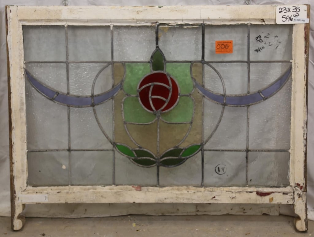 FRENCH ART NOUVEAU STAINED GLASS PANEL: French Art Nouveau stained glass panel with rose and leaf medallion and purple garland accents. Approximate dimensions: h. 23", w. 35" Disclaimer: This is an online court ordered bankruptcy sale. Part