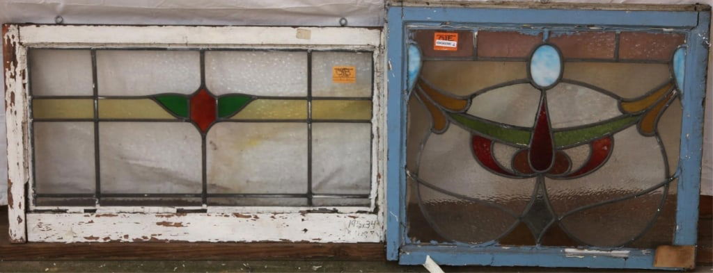 TWO ANTIQUE CONTINENTAL STAINED GLASS PANELS: Two antique Continental stained glass panels, one featuring blue wispy glass accents. Approximate dimensions: h. 24", w. 28" Disclaimer: This is an online court ordered bankruptcy sale. Participating