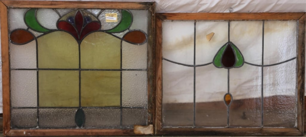 TWO CONTENENTAL STAINED GL: Two antique Continental stained glass panels with multicolored stained glass accents. Approximate dimensions: h. 17", w. 31.5" Disclaimer: This is an online court ordered bankruptcy sale. Participatin