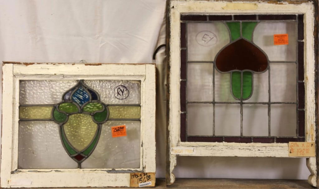 TWO ANTIQUE CONTINENTAL STAINED GLASS PANELS: Two antique Continental stained glass panels with floral medallions. Approximate dimensions: h. 21.5", w. 22" Disclaimer: This is an online court ordered bankruptcy sale. Participating bidders must ha