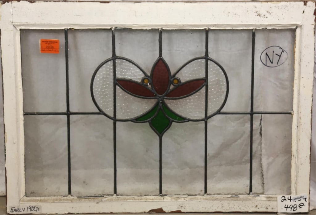 FRENCH ART NOUVEAU STAINED GLASS PANEL: French Art Nouveau stained glass panel with floral medallion and colorless leaded glass panels. Approximate dimensions: h. 24", w. 44" Disclaimer: This is an online court ordered bankruptcy sale. Part