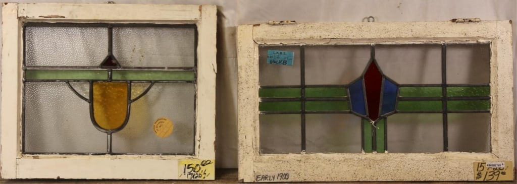 TWO ENGLISH ART DECO STAINED GLASS PANELS: Two English Art Deco stained glass panels with multicolored geometrical accents. Approximate dimensions: h. 15", w. 26" Disclaimer: This is an online court ordered bankruptcy sale. Participating bidde