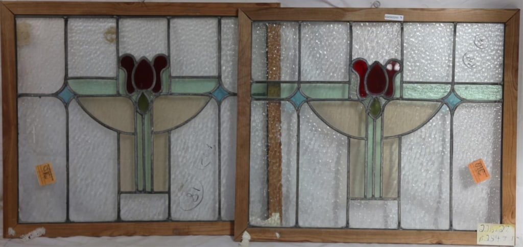 PAIR OF ENGLISH STAINED GLASS PANELS: Pair of English stained glass panels with rose medallions and green and blue stained glass accents. Approximate dimensions: h. 22.5", w. 27" Disclaimer: This is an online court ordered bankruptcy sale
