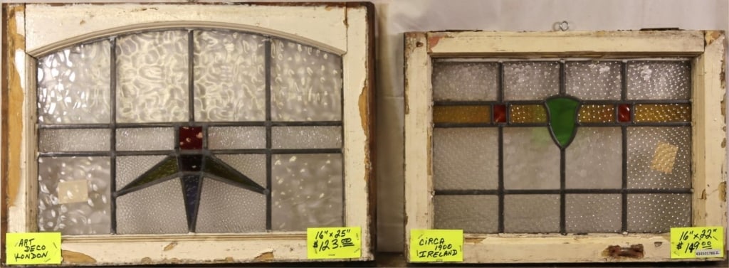 TWO ANTIQUE CONTINENTAL STAINED GLASS PANELS: Two antique Continental stained glass panels with multicolored floral medallions. Approximate dimensions: h. 37", w. 23.5" Disclaimer: This is an online court ordered bankruptcy sale. Participating bi