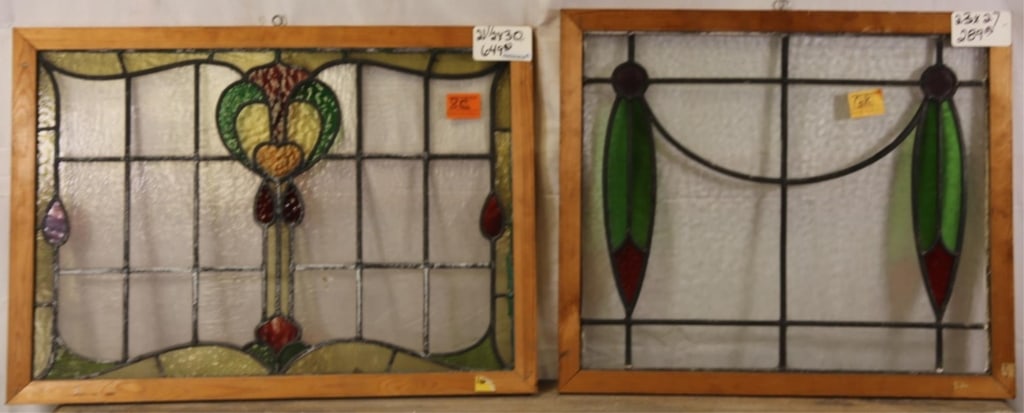 TWO FRENCH ART NOUVEAU STAINED GLASS PANELS: Two French Art Nouveau stained glass panels with floral motif and wispy glass accents. Approximate dimensions: h. 23", w. 27" Disclaimer: This is an online court ordered bankruptcy sale. Participating
