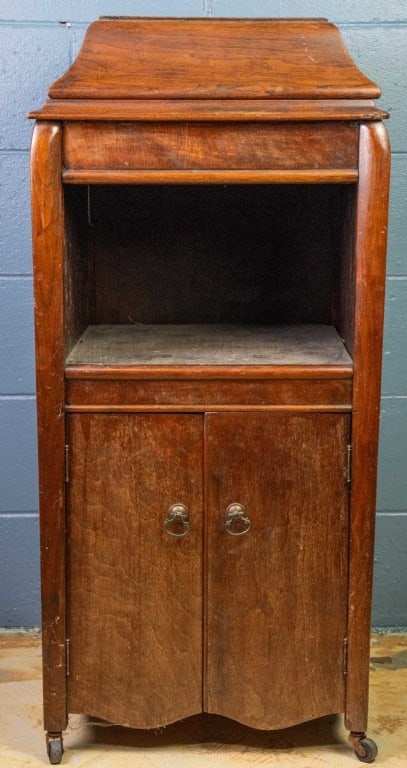 AMERICAN VICTROLA RECORD CABINET (NO INTERIOR): American Victrola record cabinet, without interior. Approximate dimensions: h. 41", w. 19", d. 21" Disclaimer: This is an online court ordered bankruptcy sale. Participating bidders must have a credit