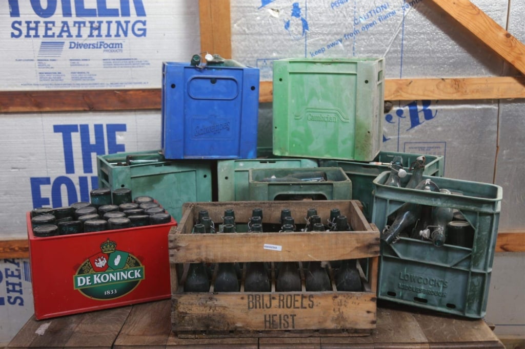 ANTIQUE CONTINENTAL BEER & WINE BOTTLES: Nine cases of antique Continental beer and wine bottles. Disclaimer: This is an online court ordered bankruptcy sale. Participating bidders must have a credit card on file with Live Auctioneers. Credi