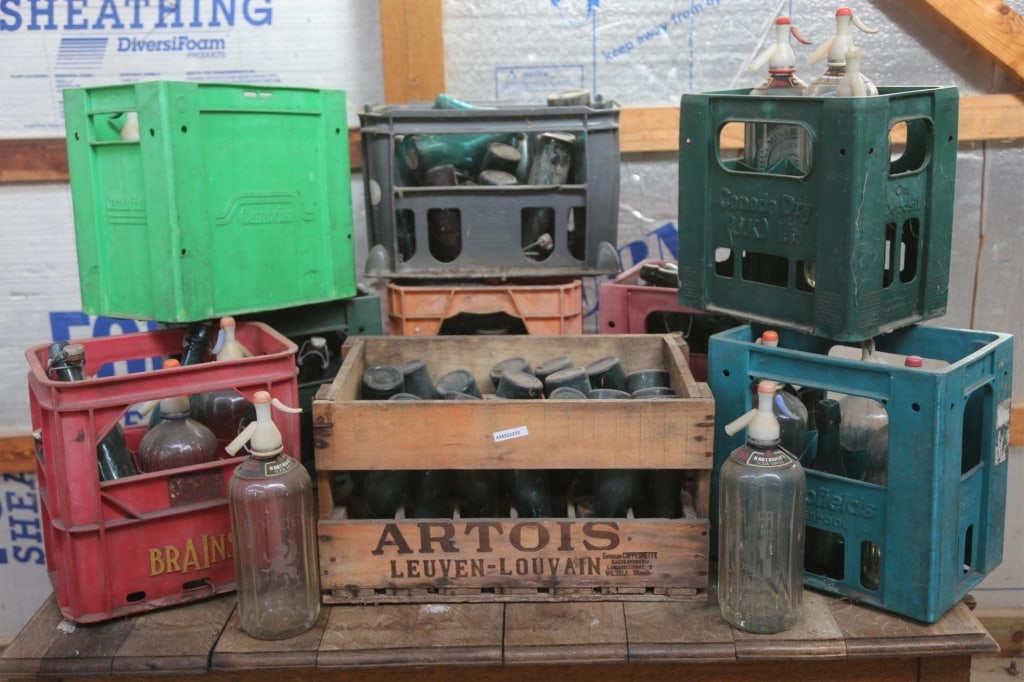 ANTIQUE CONTINENTAL WINE & SELTZER BOTTLES: Eight cases of antique Continental wine and seltzer bottles. Disclaimer: This is an online court ordered bankruptcy sale. Participating bidders must have a credit card on file with Live Auctioneers. C