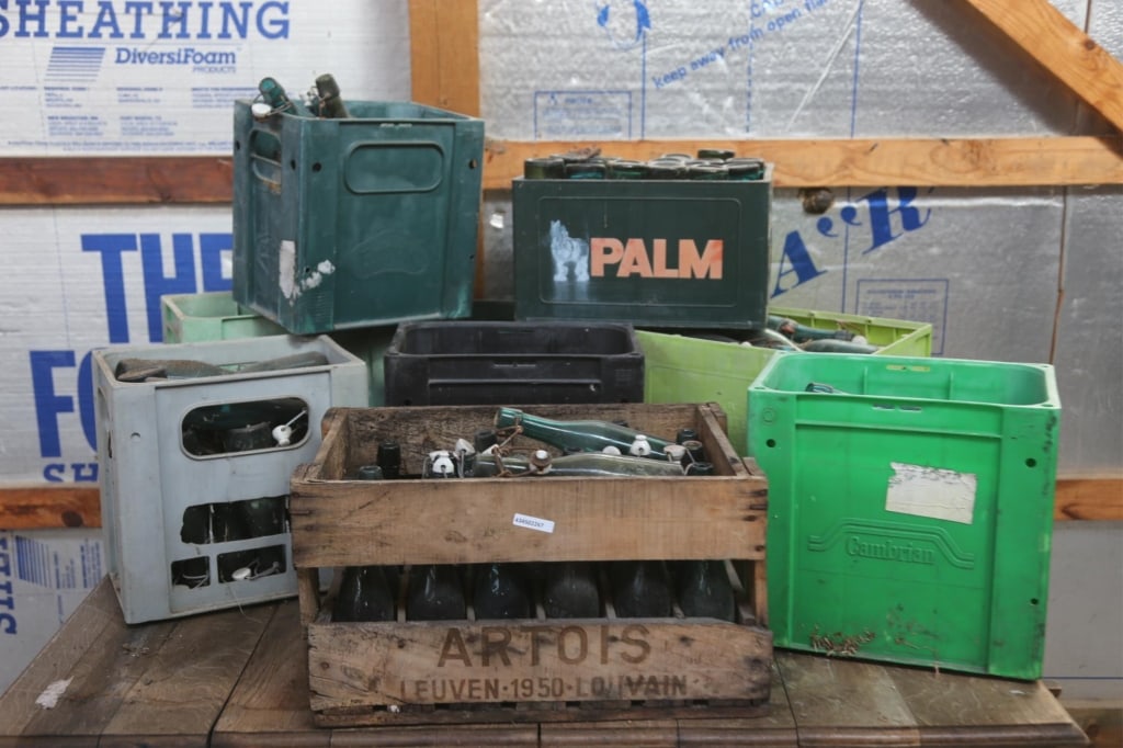 ANTIQUE CONTINENTAL BEER & WINE BOTTLES: Nine cases of antique Continental beer and wine bottles. Disclaimer: This is an online court ordered bankruptcy sale. Participating bidders must have a credit card on file with Live Auctioneers. Credi