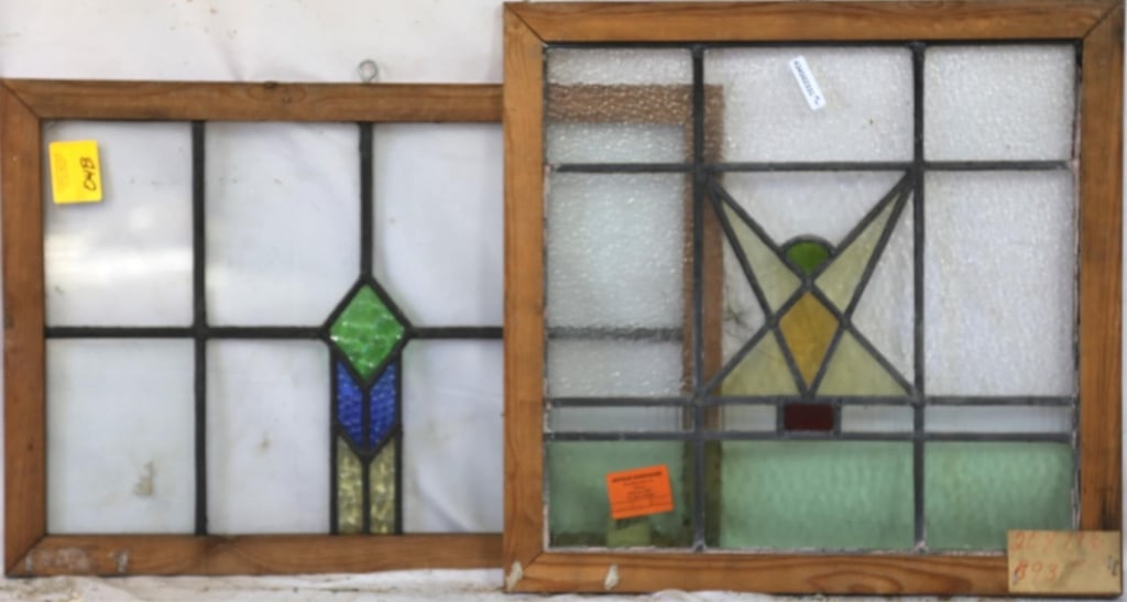 TWO ENGLISH ART DECO STAINED GLASS PANELS: Two English Art Deco stained glass panels with multicolored geometric medallions. Approximate dimensions: h. 20", w. 19.5" Disclaimer: This is an online court ordered bankruptcy sale. Participating bi
