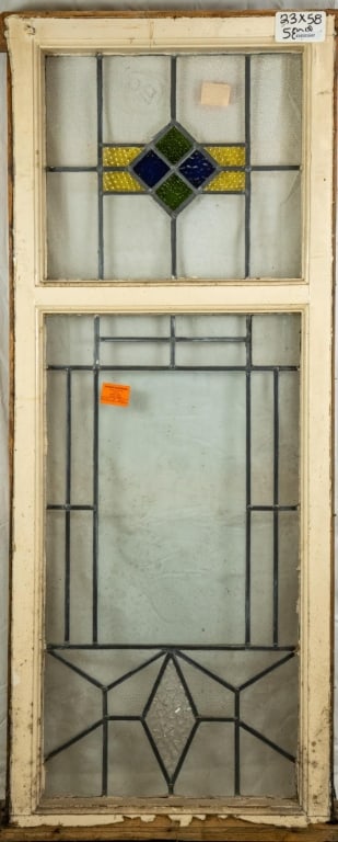 ENGLISH ART DECO STAINED GLASS PANEL: English Art Deco stained glass panel. Approximate dimensions: h. 58", w. 23" Disclaimer: This is an online court ordered bankruptcy sale. Participating bidders must have a credit card on file with Liv