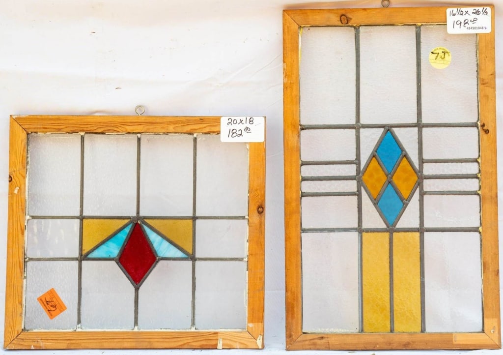 TWO FRENCH STAINED GLASS PANELS: Two French stained glass panels with geometric medallions. Approximate dimensions: h. 16.5", w. 26.5" Disclaimer: This is an online court ordered bankruptcy sale. Participating bidders must have a cre