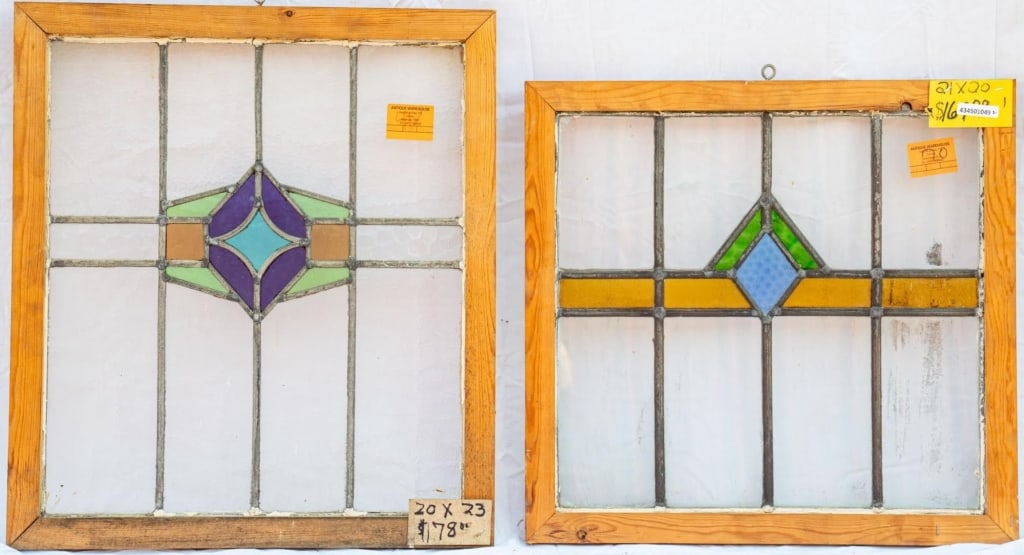 TWO FRENCH STAINED GLASS PANELS: Two French stained glass panels with geometric medallions. Approximate dimensions: h. 23", w. 20" Disclaimer: This is an online court ordered bankruptcy sale. Participating bidders must have a credit