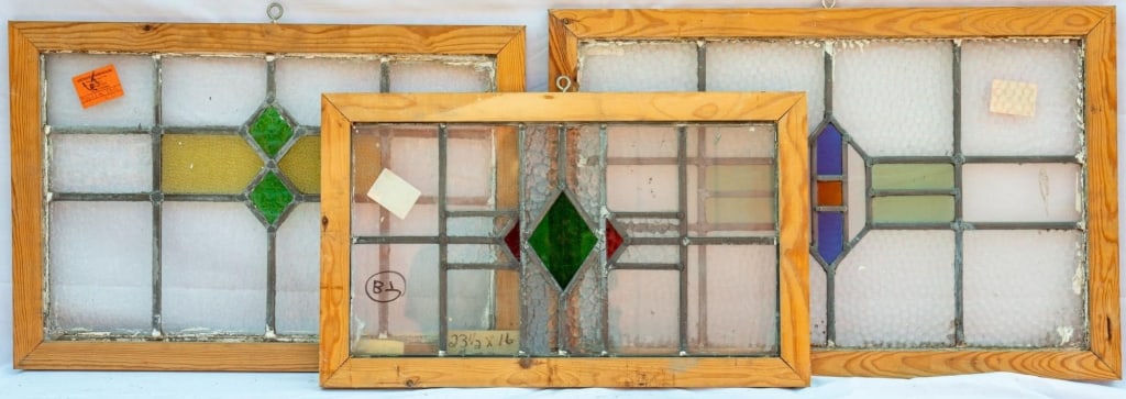 THREE FRENCH STAINED GLASS PANELS: Three French stained glass panels with a geometric motif. Approximate dimensions: h. 17", w. 25.5" Disclaimer: This is an online court ordered bankruptcy sale. Participating bidders must have a credit