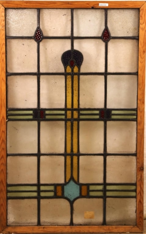 ENGLISH ART DECO STAINED GLASS PANEL: English Art Deco stained glass panel with a multicolored geometric medallion. Approximate dimensions: h. 46", w. 29" Disclaimer: This is an online court ordered bankruptcy sale. Participating bidders