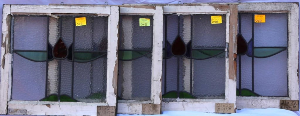 SET 4 ANTIQUE STAINED GLASS WINDOWS: Set of 4 antique stained glass windows. Approximate dimensions: h. 21", w. 22" Disclaimer: This is an online court ordered bankruptcy sale. Participating bidders must have a credit card on file with L