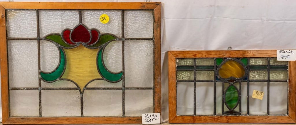 TWO FRENCH STAINED GLASS PANELS: Two French stained glass panels with a floral motif. Approximate dimensions: h. 23", w. 30" Disclaimer: This is an online court ordered bankruptcy sale. Participating bidders must have a credit card o