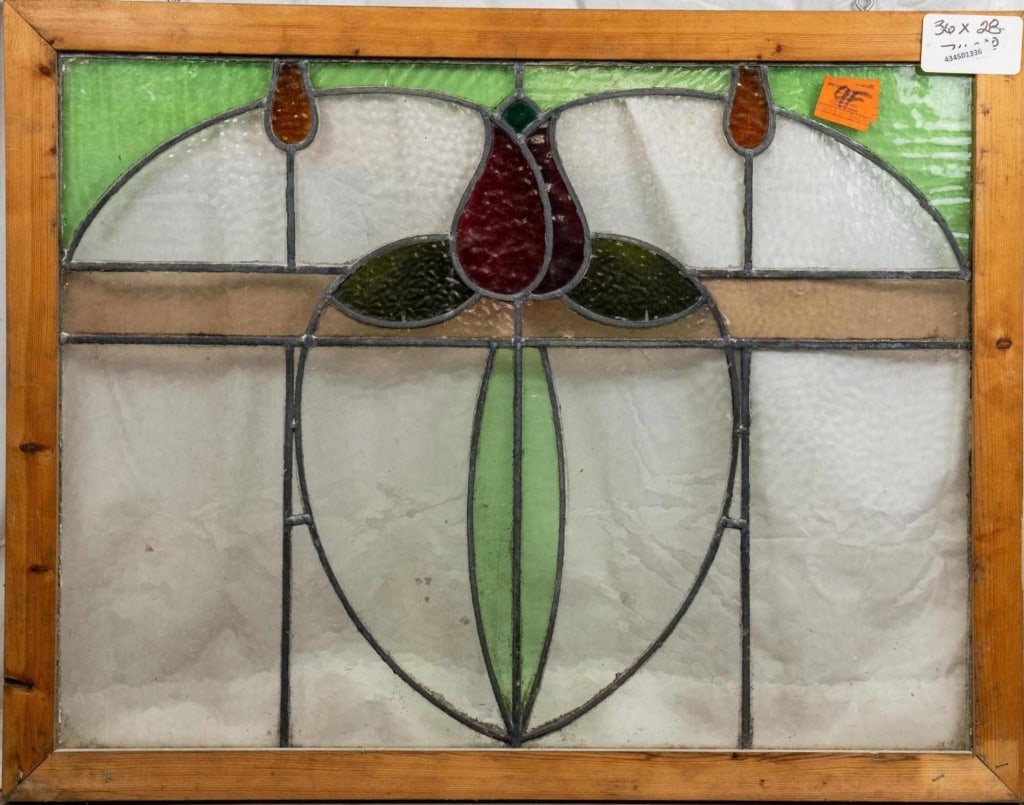 FRENCH ART NOUVEAU STAINED GLASS PANEL: French Art Nouveau stained glass panel with a floral heart-shaped medallion and amber floral accents on the sides. Approximate dimensions: h. 26", w. 28" Disclaimer: This is an online court ordered ba