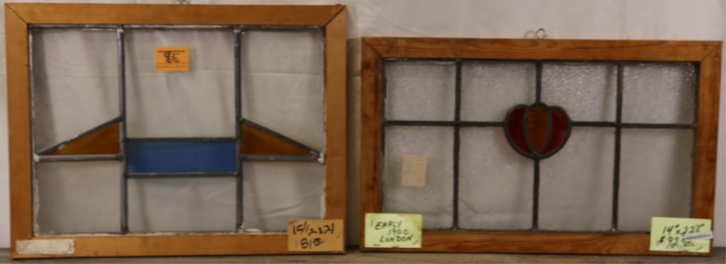 TWO ANTIQUE ENGLISH STAINED GLASS PANELS: Two antique English stained glass panels with geometric and floral medallions. Approximate dimensions: h. 15.5", w. 21" Disclaimer: This is an online court ordered bankruptcy sale. Participating bidde