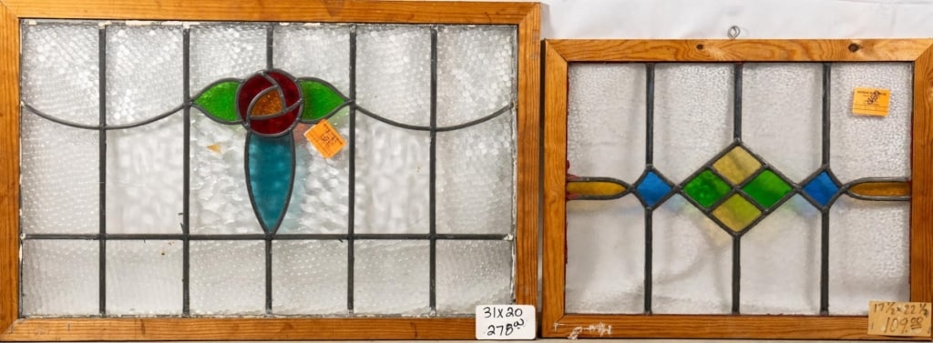 TWO CONTINENTAL STAINED GLASS PANELS: Two Continental stained glass panels. Approximate dimensions: h. 20", w. 31" Disclaimer: This is an online court ordered bankruptcy sale. Participating bidders must have a credit card on file with Liv