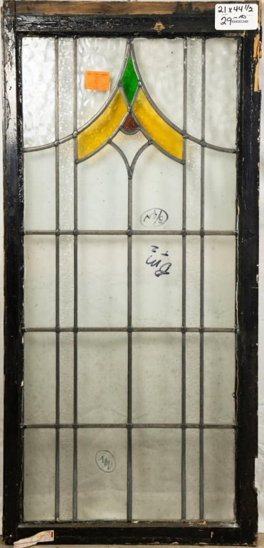 ENGLISH ART DECO STAINED GLASS PANEL: English Art Deco stained glass panel. Approximate dimensions: h. 44.5", w. 21" Disclaimer: This is an online court ordered bankruptcy sale. Participating bidders must have a credit card on file with L