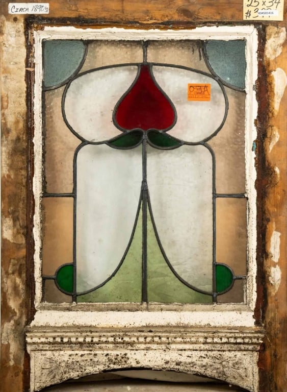 FRENCH ART NOUVEAU STAINED GLASS PANEL: French Art Nouveau stained glass panel with rose and leaf motif. Approximate dimensions: h. 34", w. 25" Disclaimer: This is an online court ordered bankruptcy sale. Participating bidders must have a c