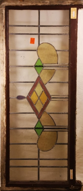 ANTIQUE CONTINENTAL STAINED GLASS PANEL: Antique Continental stained glass panel with multicolored central medallion. Approximate dimensions: h. 26.5", w. 66" Disclaimer: This is an online court ordered bankruptcy sale. Participating bidders