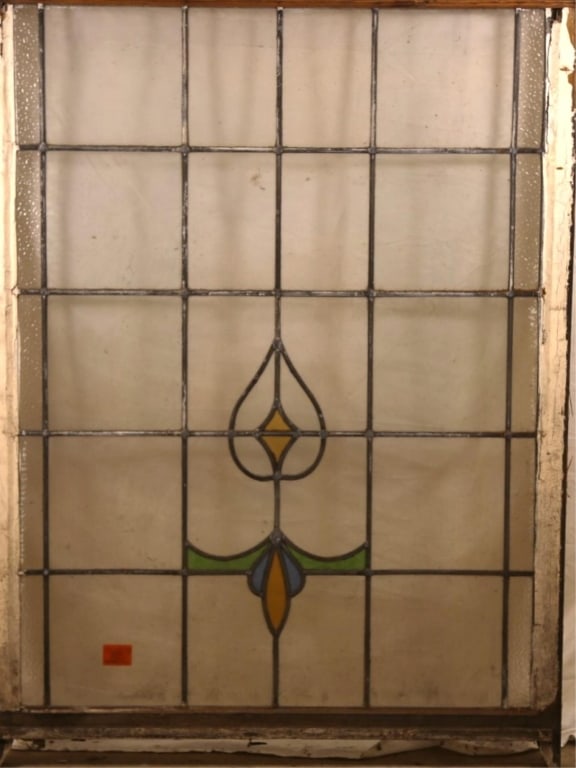ANTIQUE CONTINENTAL STAINED GLASS PANEL: Antique Continental stained glass panel with floral medallion and colorless leaded glass panels. Approximate dimensions: h. 55.5", w. 41" Disclaimer: This is an online court ordered bankruptcy sale. P