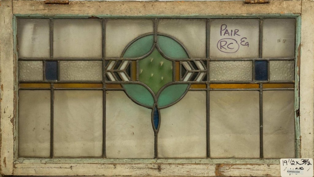 CONTINENTAL ART DECO STAINED GLASS PANEL: Continental Art Deco stained glass panel with abstract geometric elements. Approximate dimensions: h. 19.5", w. 34.5" Disclaimer: This is an online court ordered bankruptcy sale. Participating bidders