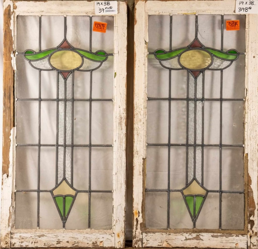 PAIR OF CONTINENTAL ART NOUVEAU STAINED GLASS PANE: Pair of Continental Art Nouveau stained glass panels. Approximate dimensions: h. 38", w. 19" Disclaimer: This is an online court ordered bankruptcy sale. Participating bidders must have a credit card
