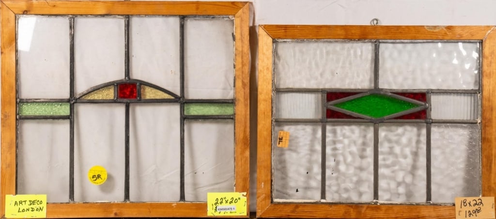 TWO ENGLISH ART DECO STAINED GLASS PANELS: Two English Art Deco stained glass panels with geometric multicolored elements. Approximate dimensions: h. 20", w. 22" Disclaimer: This is an online court ordered bankruptcy sale. Participating bidder