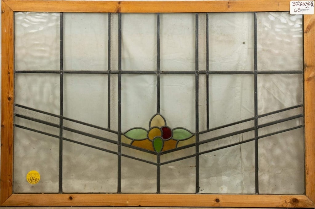 FRENCH ART NOUVEAU STAINED GLASS PANEL: French Art Nouveau stained glass panel with a floral medallion. Approximate dimensions: h. 30.5", w. 46.5" Disclaimer: This is an online court ordered bankruptcy sale. Participating bidders must have