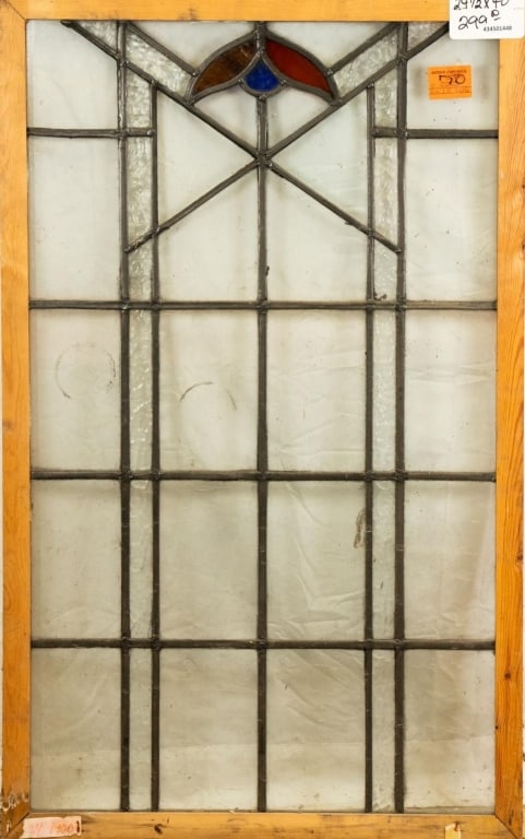 FRENCH ART NOUVEAU STAINED GLASS PANEL: French Art Nouveau stained glass panel with floral motif and wispy glass accent. Approximate dimensions: h. 40", w. 24.5" Disclaimer: This is an online court ordered bankruptcy sale. Participating bid