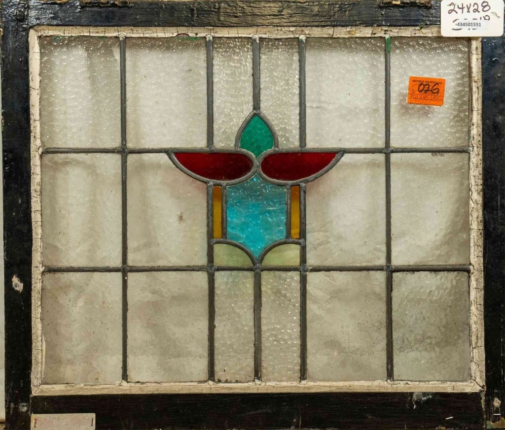 ENGLISH ART NOUVEAU STAINED GLASS PANEL: English Art Nouveau stained glass panel with floral medallion. Approximate dimensions: h. 24', w. 28" Disclaimer: This is an online court ordered bankruptcy sale. Participating bidders must have a cre