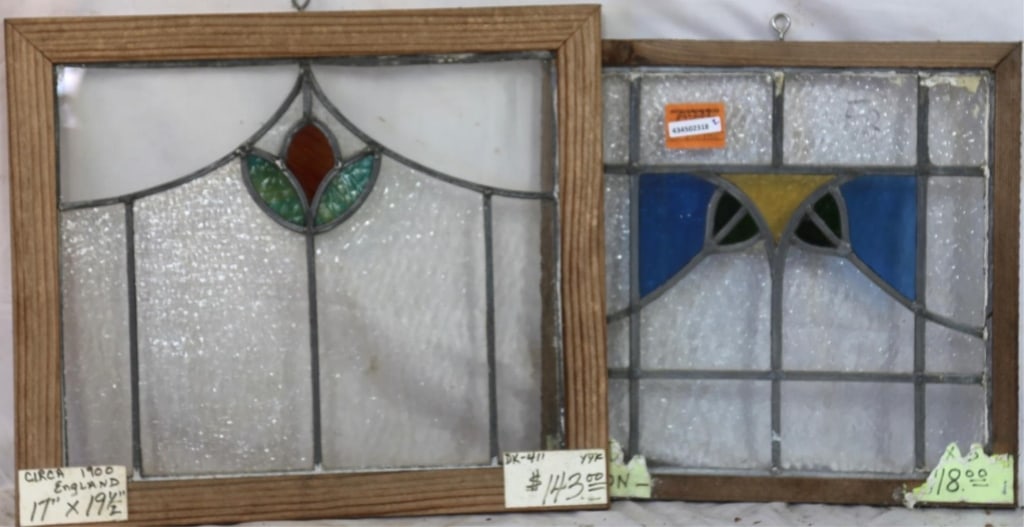 TWO ENGLISH STAINED GLASS PANELS: Two English stained glass panels with multicolored stained glass accents. Approximate dimensions: h. 17", w. 19.5" Disclaimer: This is an online court ordered bankruptcy sale. Participating bidders mu