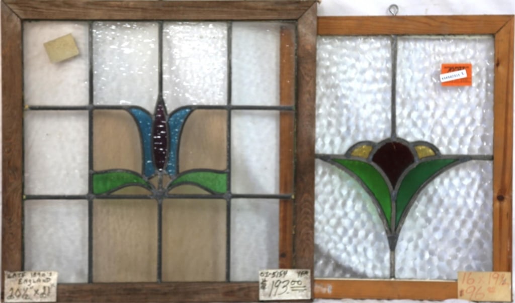 TWO ENGLISH STAINED GLASS PANELS: Two English stained glass panels with floral motif medallions in multicolored stained glass. Approximate dimensions: h. 21", w. 20.5" Disclaimer: This is an online court ordered bankruptcy sale. Parti
