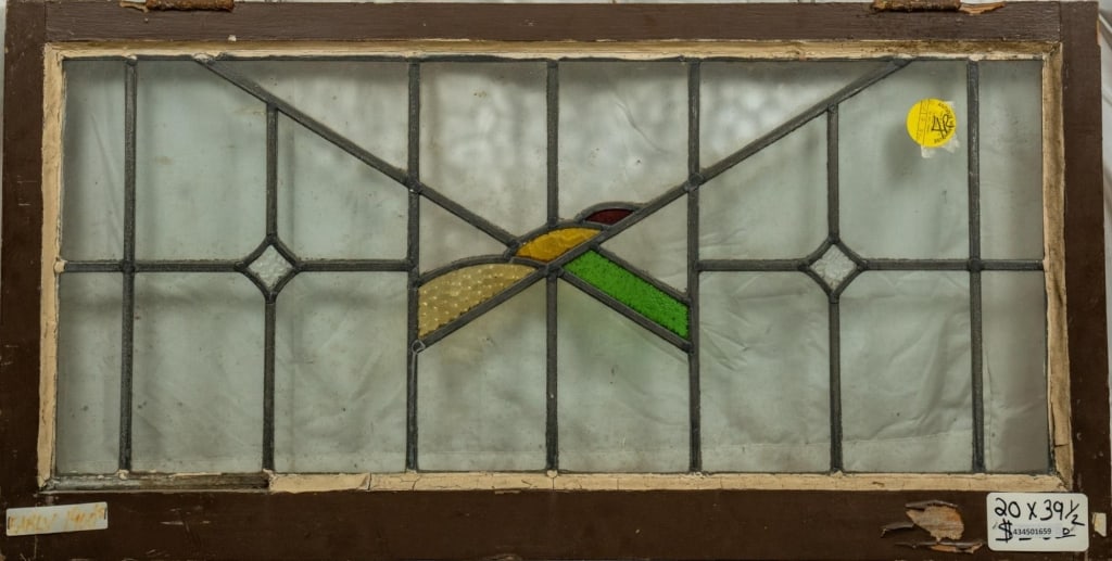 ANTIQUE ENGLISH STAINED GLASS PANEL: Antique English stained glass panel. Approximate dimensions: h. 20", w. 39.5" Disclaimer: This is an online court ordered bankruptcy sale. Participating bidders must have a credit card on file with Li