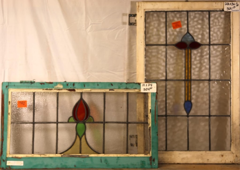 TWO ANTIQUE CONTINENTAL STAINED GLASS PANELS: Two antique Continental stained glass panels with floral motif. Approximate dimensions: h. 36.5", w. 23" Disclaimer: This is an online court ordered bankruptcy sale. Participating bidders must have a