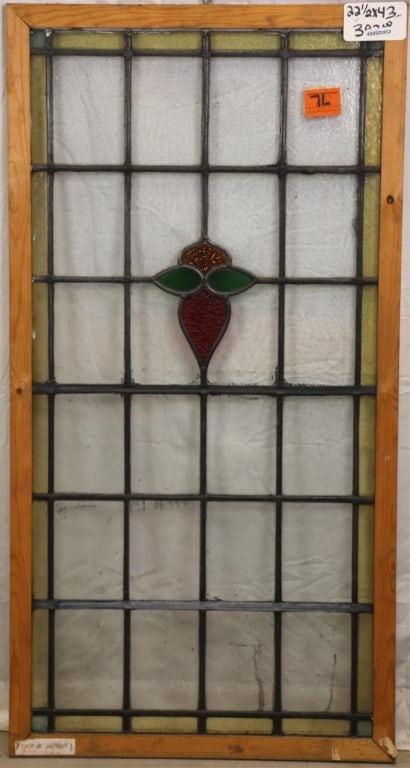 ANTIQUE ENGLISH STAINED GLASS PANEL: Antique English stained glass panel with floral medallion and colorless leaded glass panels. Approximate dimensions: h. 43", w. 22.5" Disclaimer: This is an online court ordered bankruptcy sale. Parti