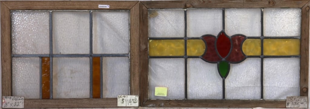 TWO ENGLISH STAINED GLASS PANELS: Two English stained glass panels with finely detailed multicolored glass accents. Approximate dimensions: h. 18", w. 22" Disclaimer: This is an online court ordered bankruptcy sale. Participating bidd